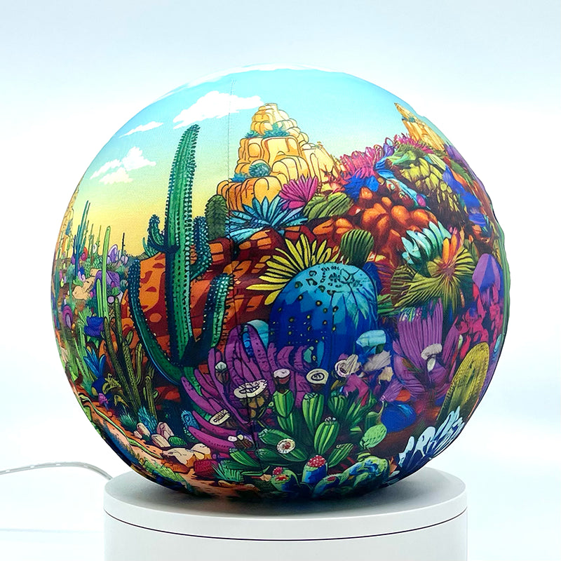 Fabric sphere cover with a colorful cactus doodle design, wrapped around a 8.7" soccer ball, 9.5" basketball ball, or a 10" globe.