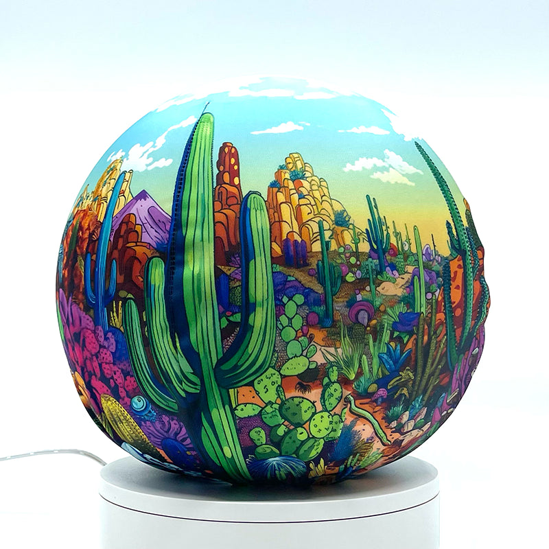 Fabric sphere cover with a colorful cactus doodle design, wrapped around a 8.7" soccer ball, 9.5" basketball ball, or a 10" globe.