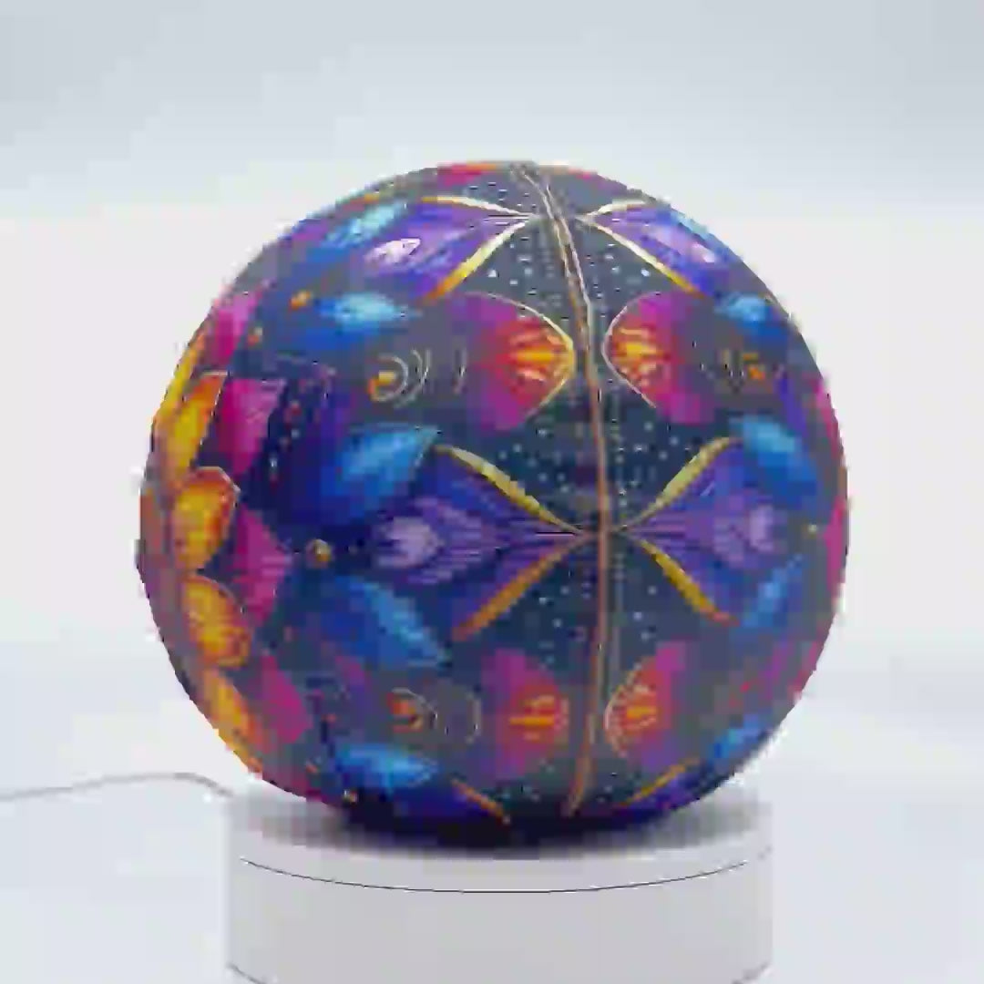 360°-rotating fabric sphere cover with a colorful mandala design, wrapped around a 8.7" soccer ball, 9.5" basketball ball, or a 10" globe.