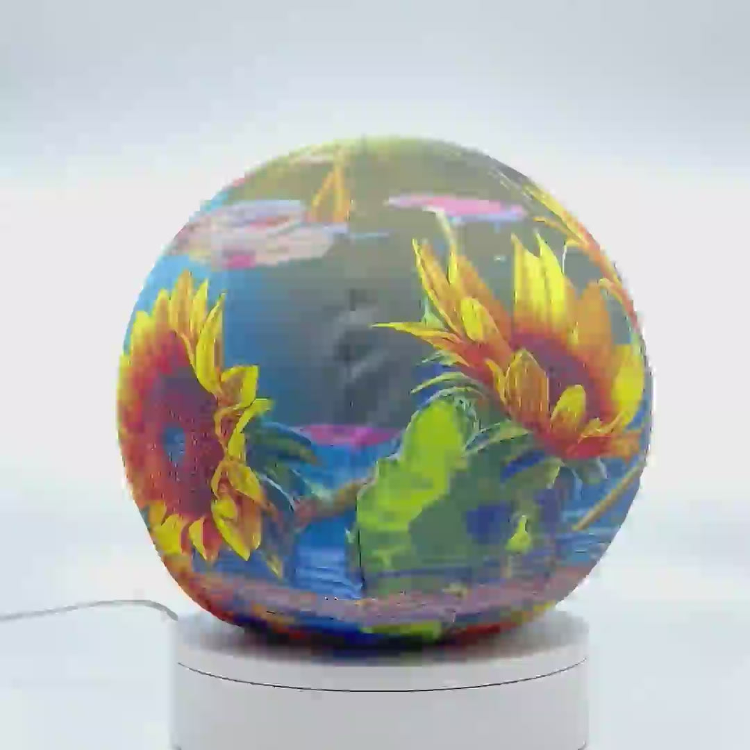 360°-rotating fabric sphere cover with a sunflower pond design, wrapped around a 8.7" soccer ball, 9.5" basketball ball, or a 10" globe.