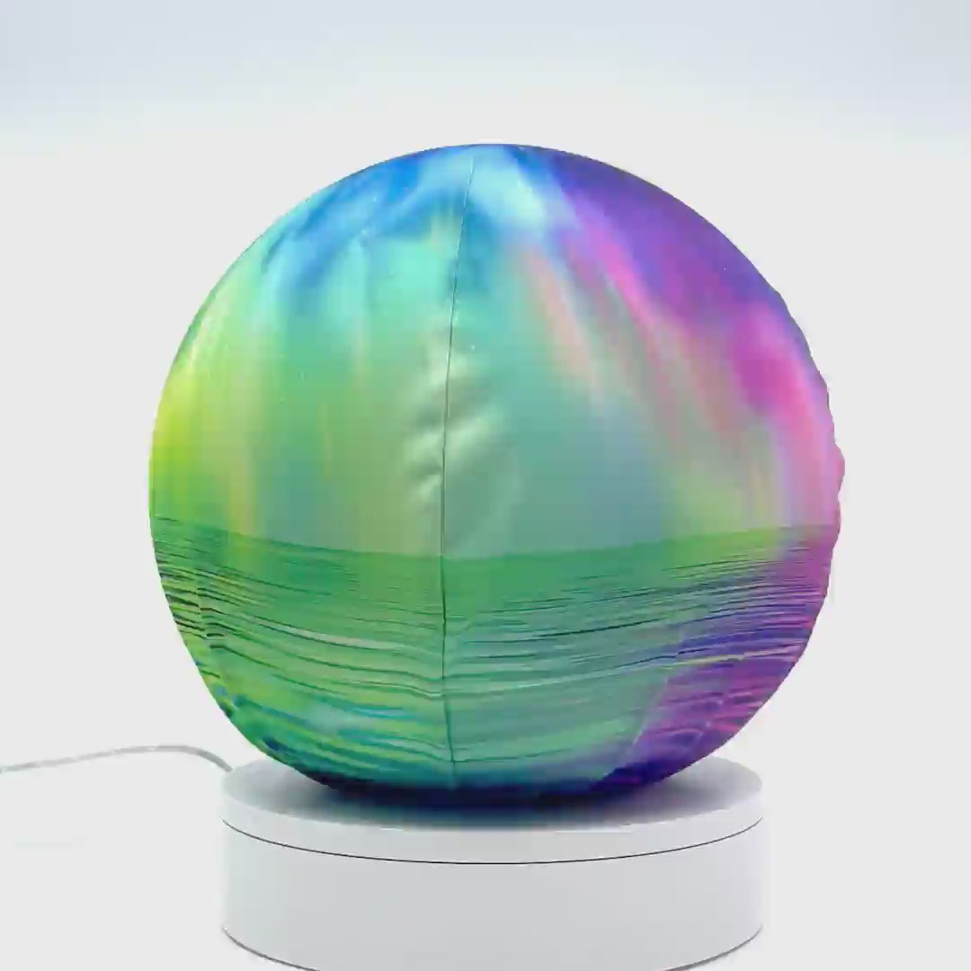 360°-rotating fabric sphere cover with a northern lights design, wrapped around a 8.7" soccer ball, 9.5" basketball ball, or a 10" globe.