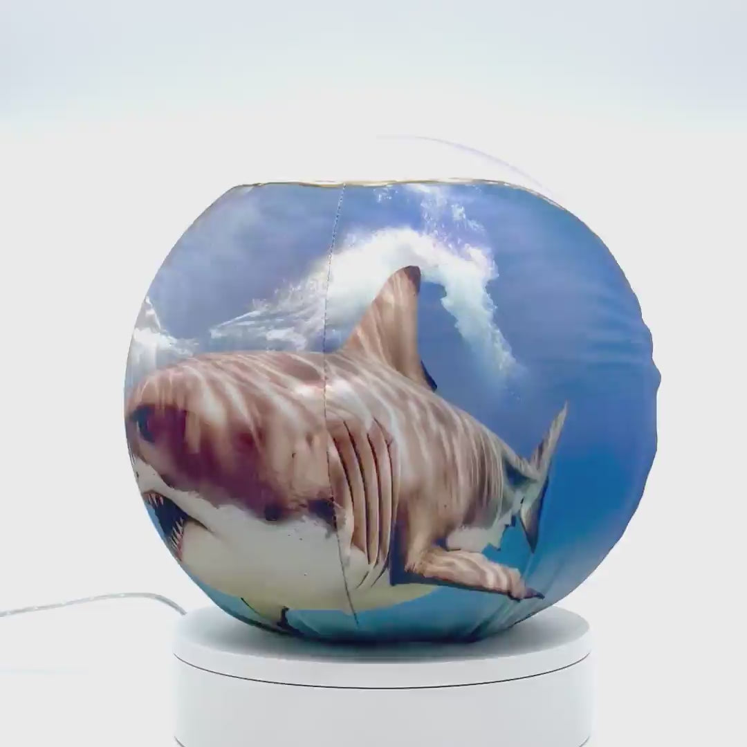 360°-rotating fabric sphere cover depicting two sharks swimming, wrapped around a 8.7" soccer ball, 9.5" basketball ball, or a 10" globe.