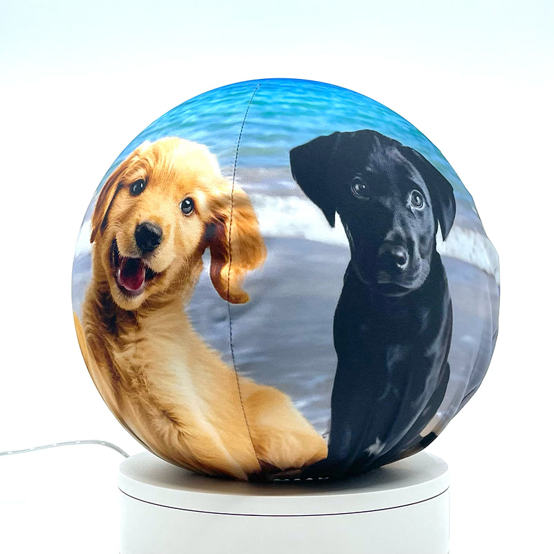 Fabric sphere cover featuring four puppies on a beach, wrapped around a 8.7" soccer ball, 9.5" basketball ball, or a 10" globe.