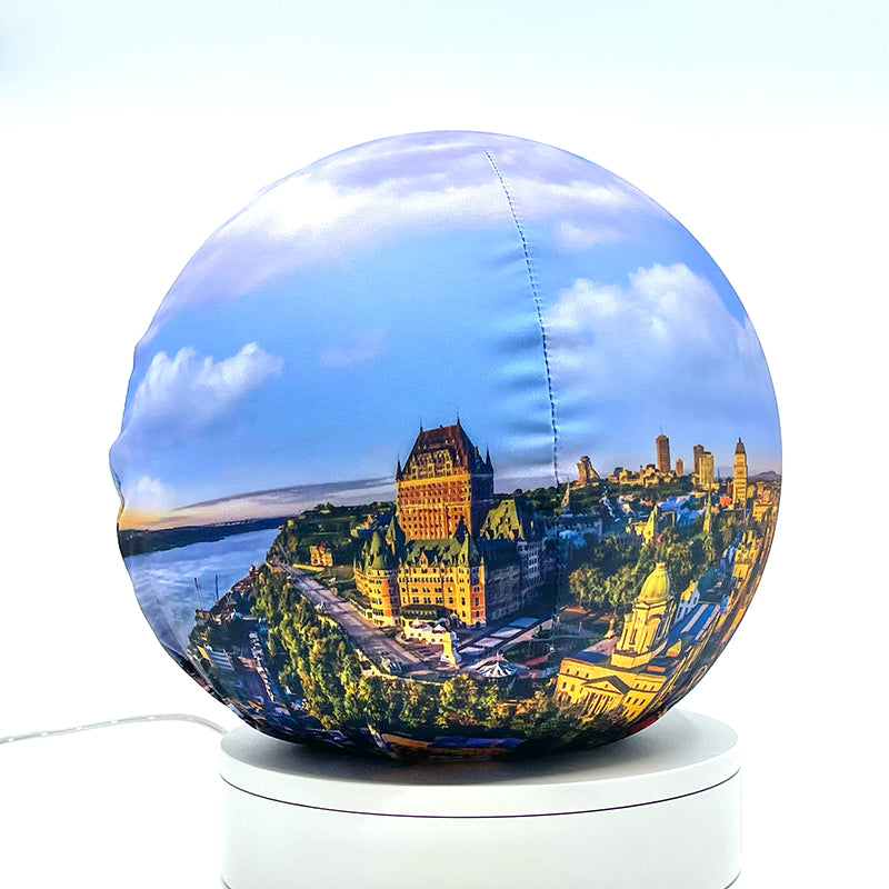 Fabric sphere cover featuring Quebec City at sunrise, wrapped around a 8.7" soccer ball, 9.5" basketball ball, or a 10" globe.