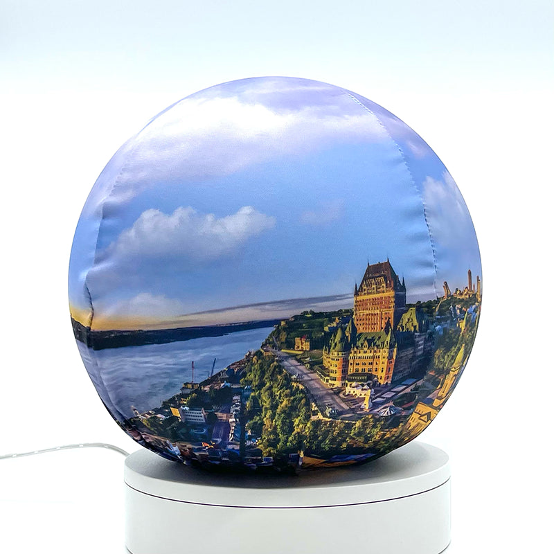 Fabric sphere cover featuring Quebec City at sunrise, wrapped around a 8.7" soccer ball, 9.5" basketball ball, or a 10" globe.