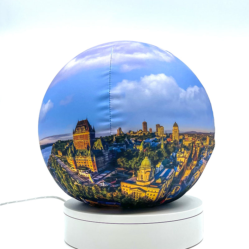 Fabric sphere cover featuring Quebec City at sunrise, wrapped around a 8.7" soccer ball, 9.5" basketball ball, or a 10" globe.